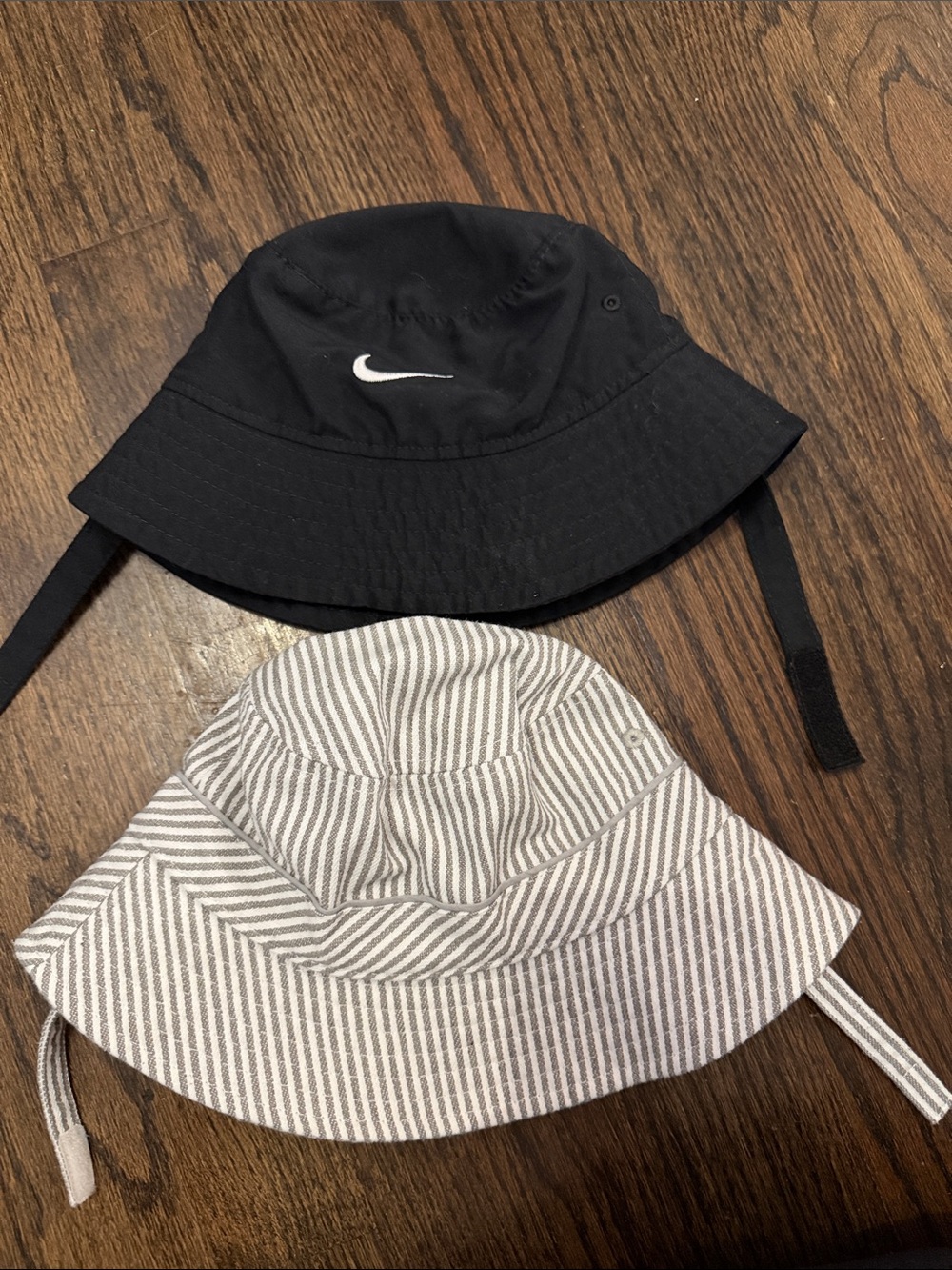 Nike Kids Black Bucket Hat with White Swoosh + Striped Tan/White Bucket Hat Set